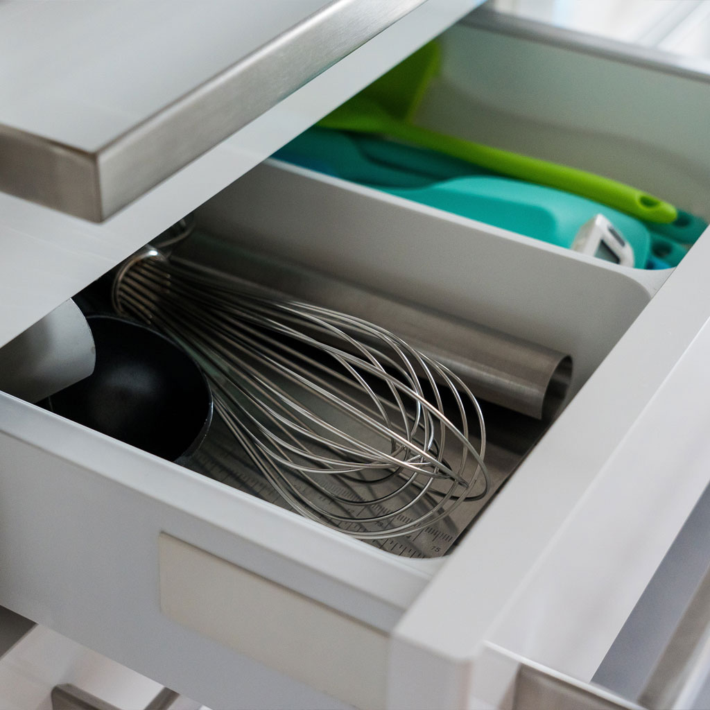 Image of kitchen pull out drawer with large D shape handles