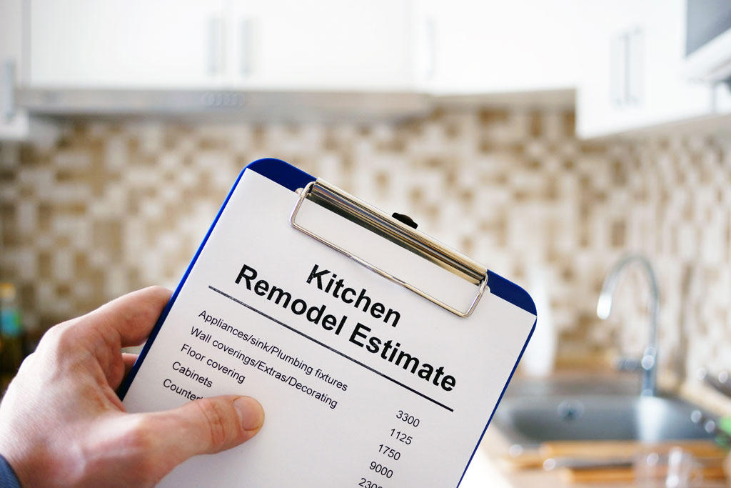 Image of a clipboard and list of kitchen remodeling budget