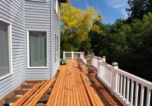 Image of a wooden deck being repaired
