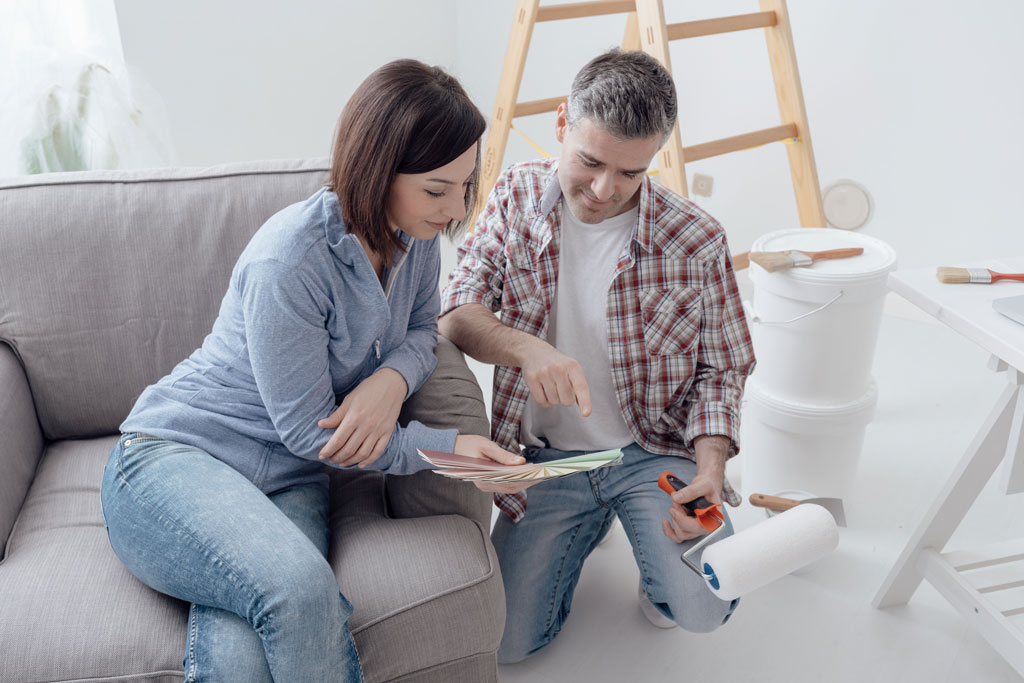 Couple considering colors to paint their home interior